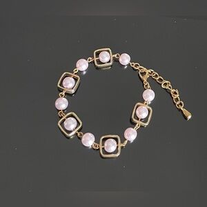 Elegant Gold and Pink Bracelet